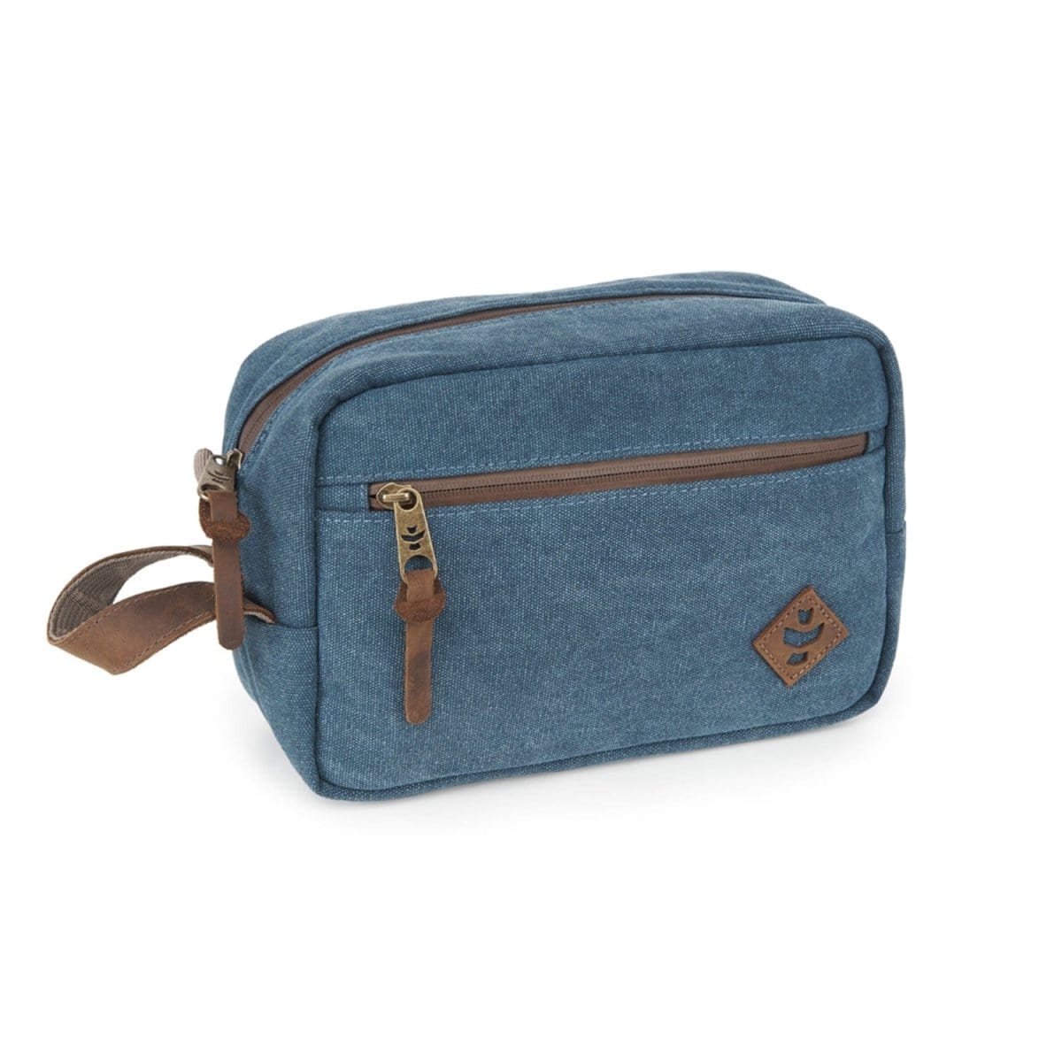 A slightly angled view of The Stowaway - Smell Proof Toiletry Kit, a dark blue zippered pouch with a carrying handle.