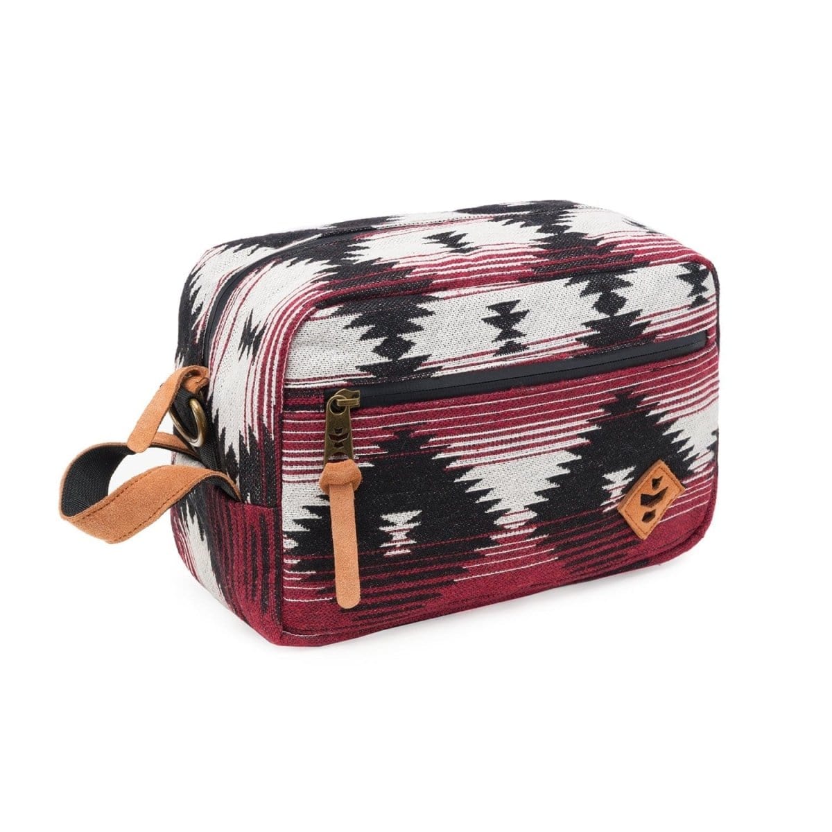 The Stowaway - Smell Proof Toiletry Kit shown from a slight angle, featuring a patterned exterior and a leather carrying handle.