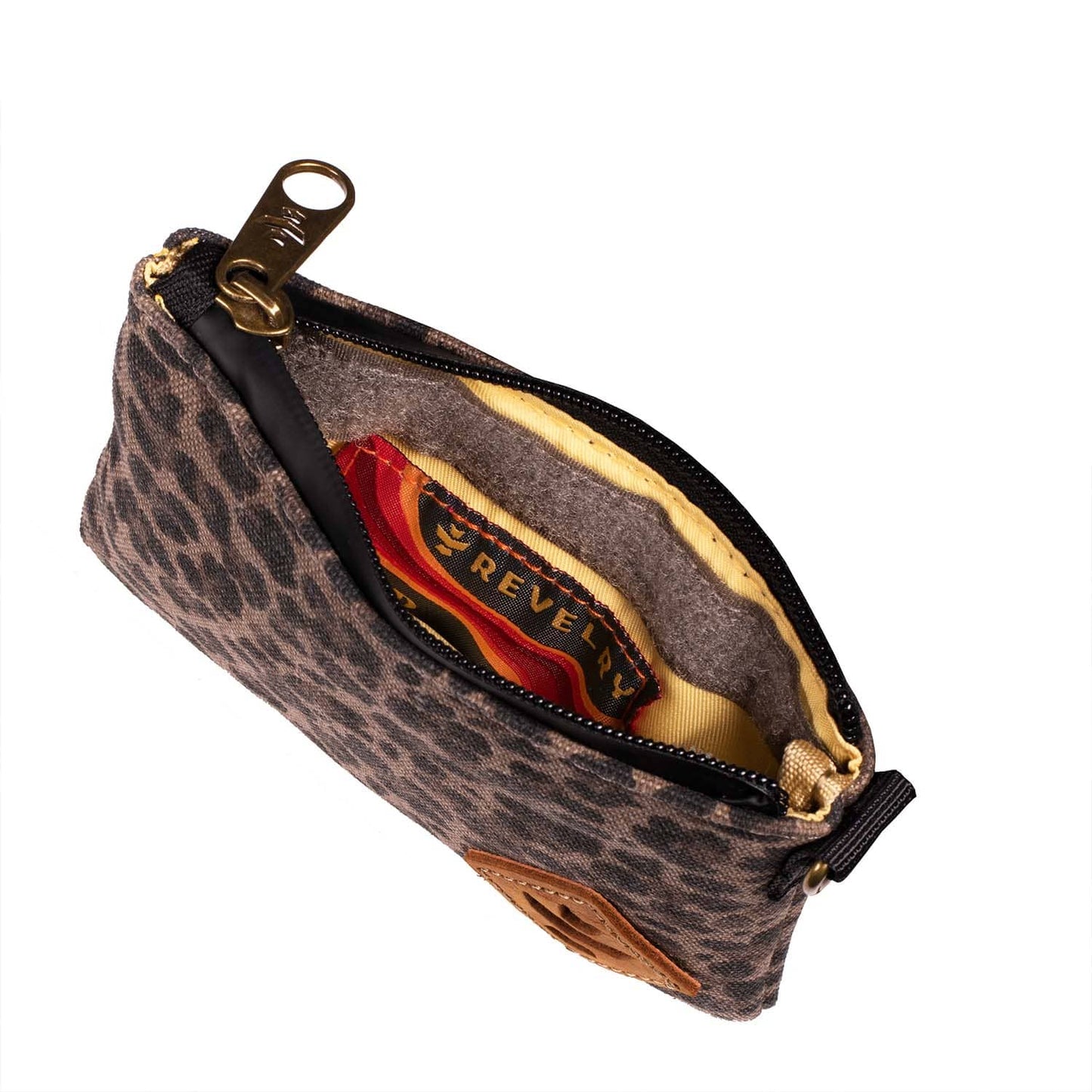 An open, small, zippered The Mini Broker - Smell Proof Zippered Small Stash Bag, showing a patterned interior.