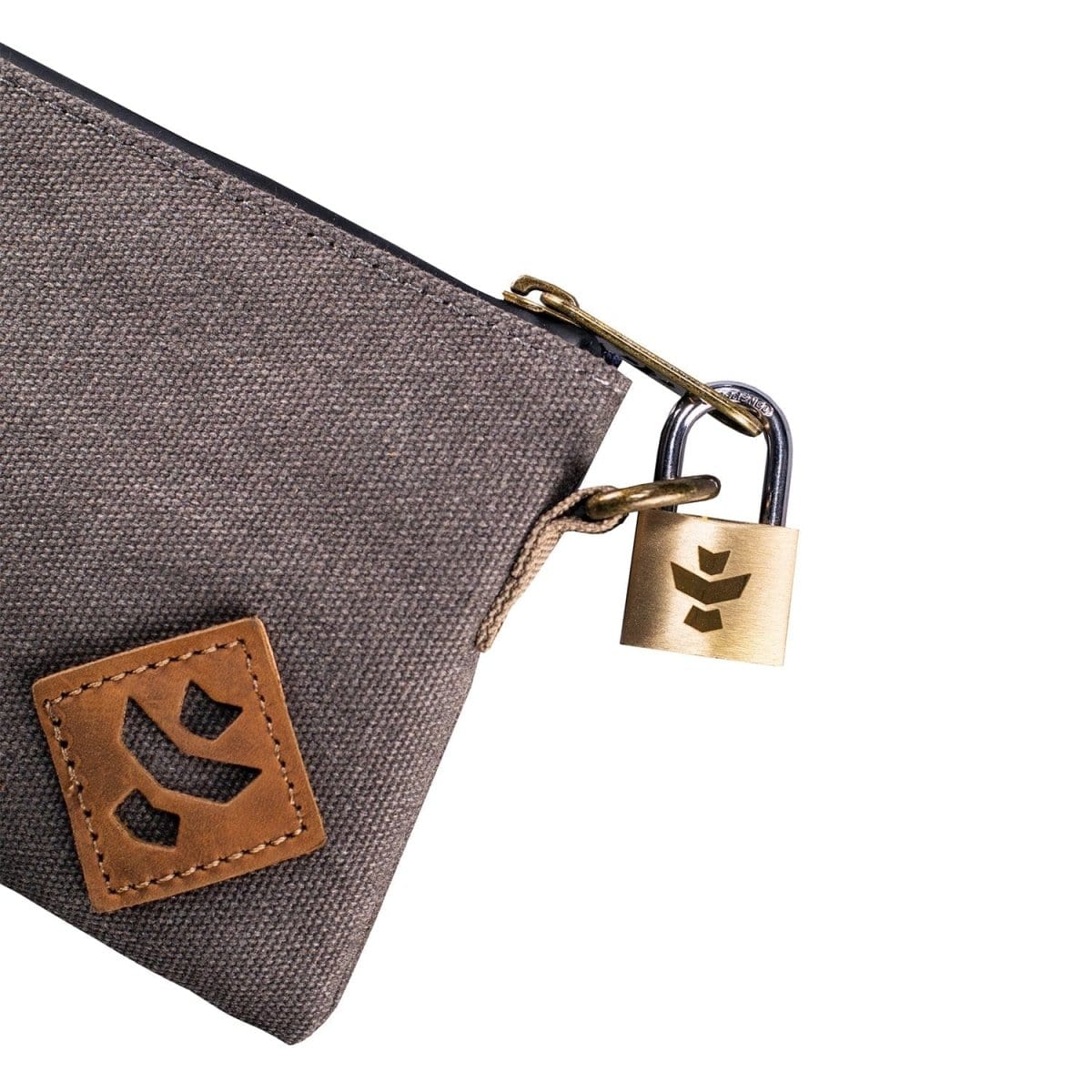 Close-up of The Mini Broker - Smell Proof Zippered Small Stash Bag, showing the metal zipper pull against a dark grey fabric.