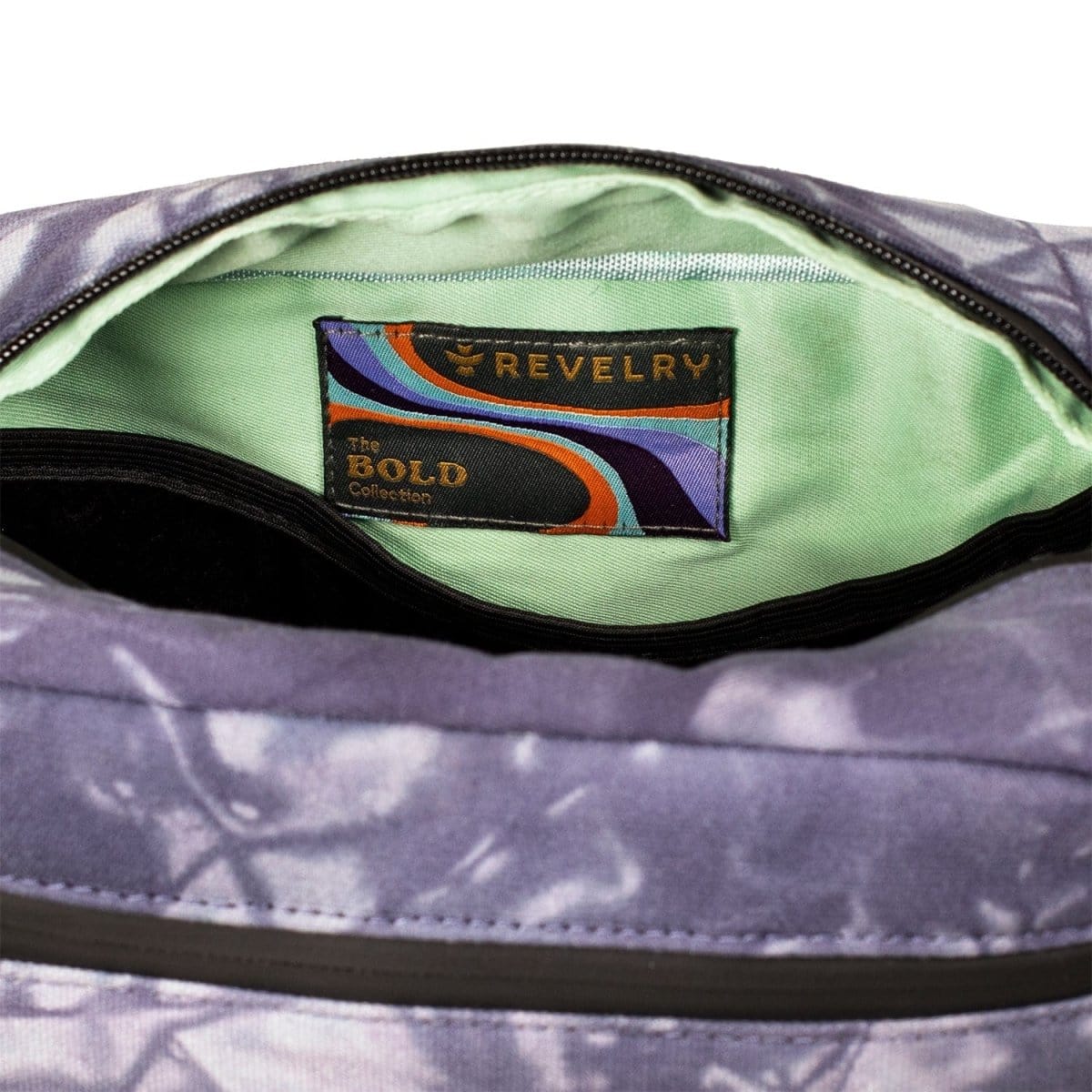 The open The Stowaway - Smell Proof Toiletry Kit with a purple interior is shown in a close-up, top-down view.