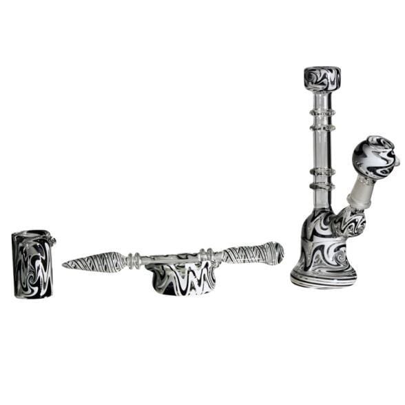 A detailed studio shot of the Glass Knucks with Dabber and Bowl 7", showcasing its curved glass design and included tools.