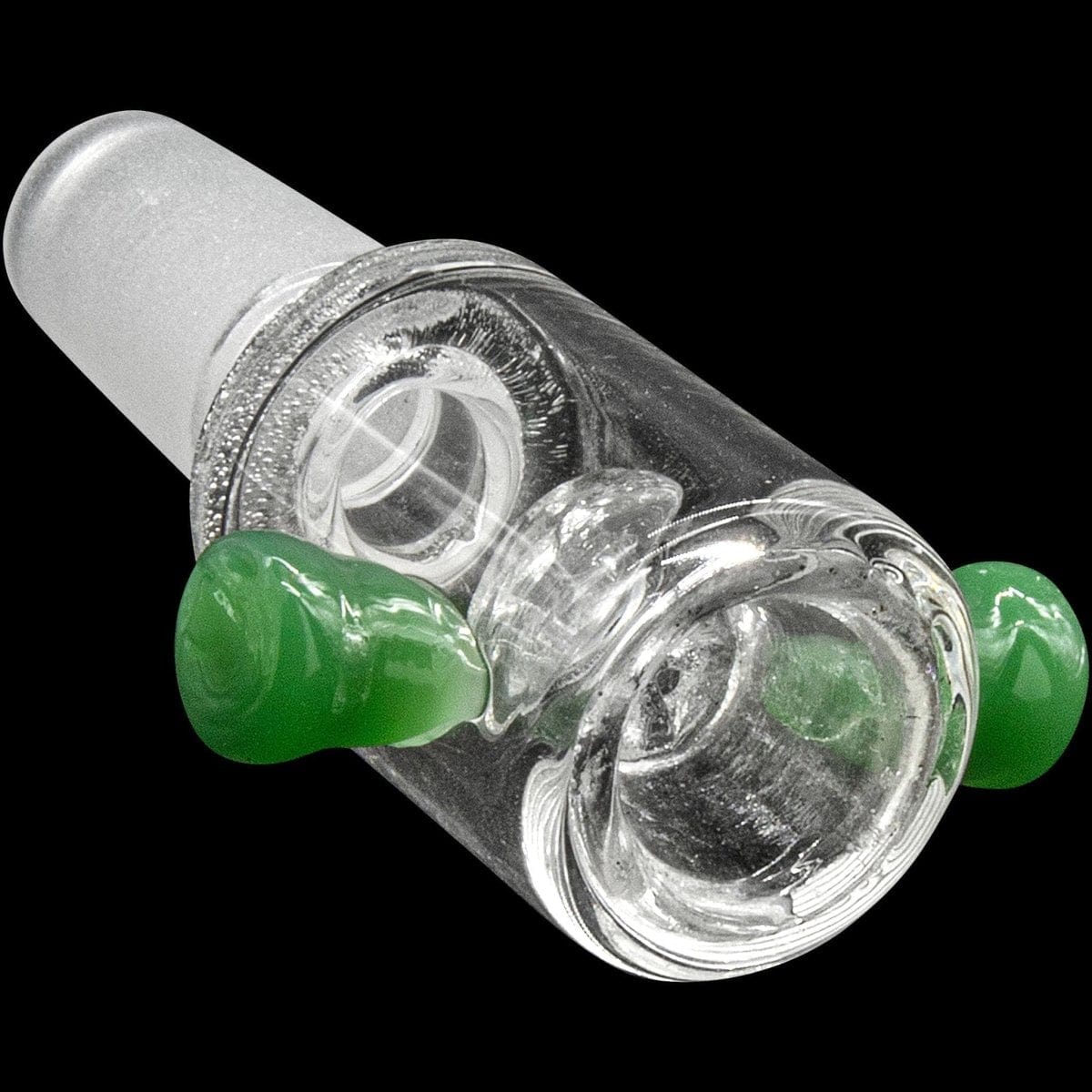 Angled close-up of the Honeycomb Cylinder Bowl with Handles showing clear glass chamber, textured joint, and two small green handles against a black background