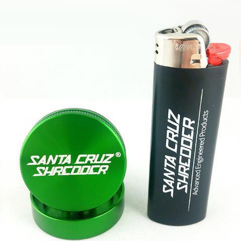 Close-up of the Santa Cruz Shredder 2 Piece Mini Grinder, showing its metallic finish and two-part construction.