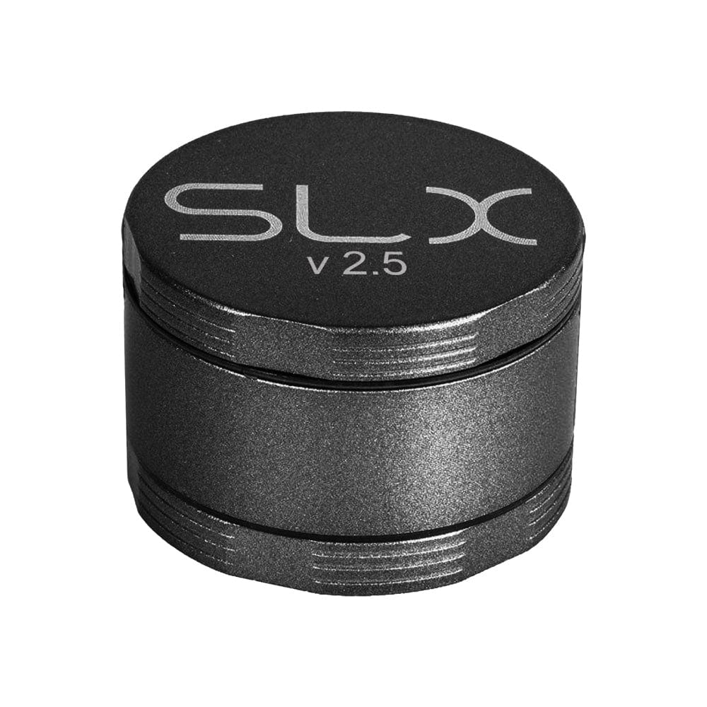 A close-up, top-down view of the SLX Ceramic Coated Metal Grinder, a dark metal cylindrical object with four visible layers.