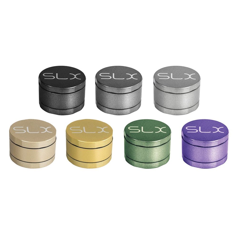 A close-up shot of the SLX Ceramic Coated Metal Grinder, displaying multiple metallic grinders arranged on a dark background.