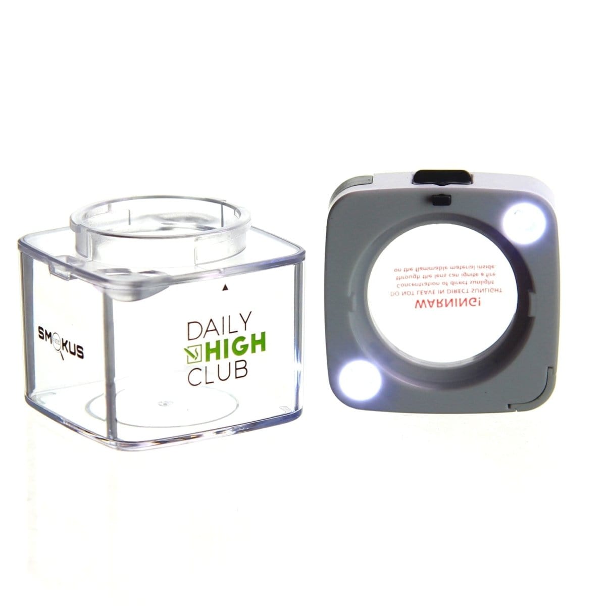 A slightly angled, close-up view of the DHC Originals x Smokus Focus Comet, showing its unique, rounded shape and smooth, dark finish.