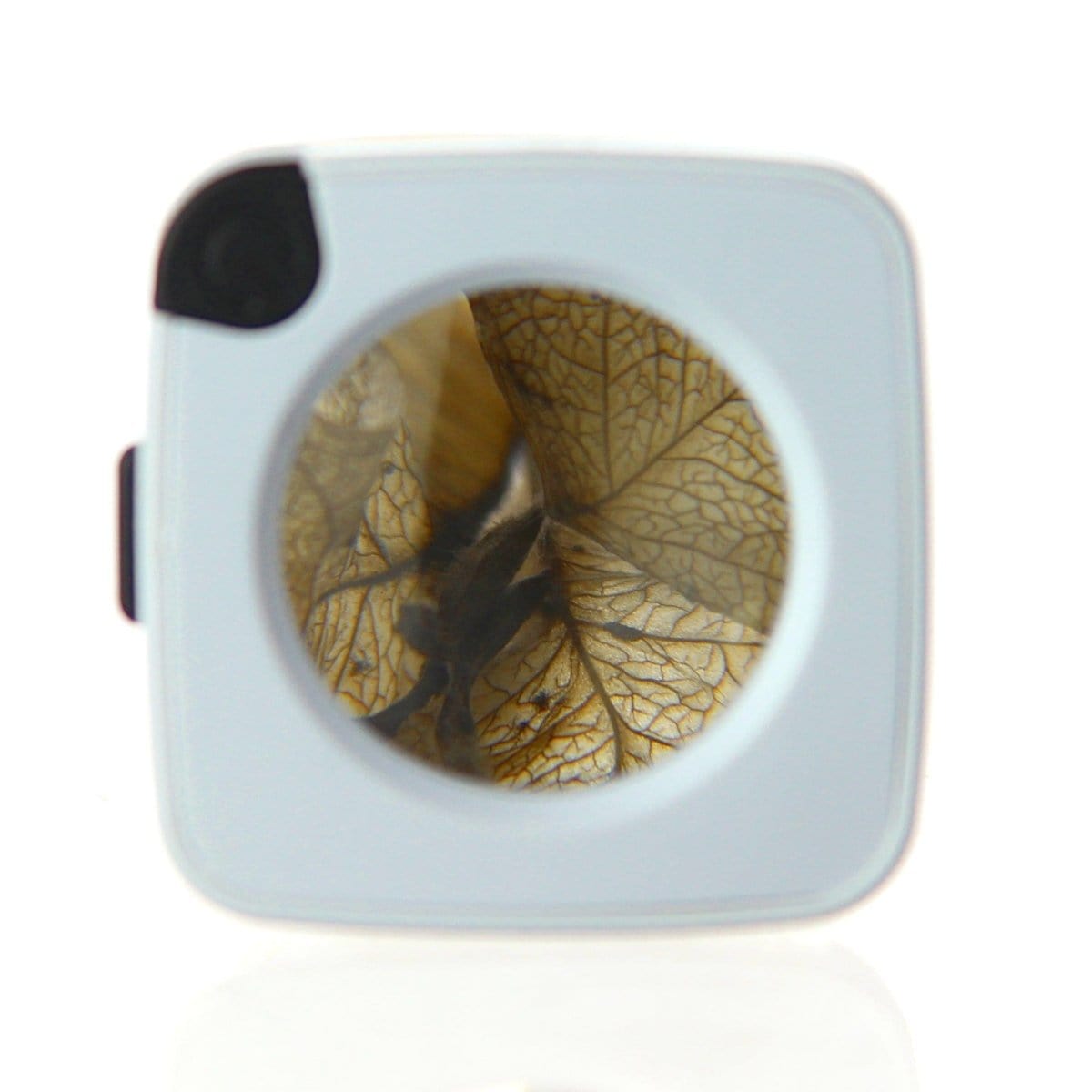 A close-up, overhead view of the bowl within the DHC Originals x Smokus Focus Comet, showcasing a hazy interior.