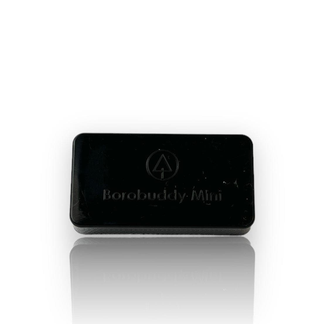 A studio shot showcases the BoroBuddy Mini™ reflecting on a polished surface, with a minimalist presentation.
