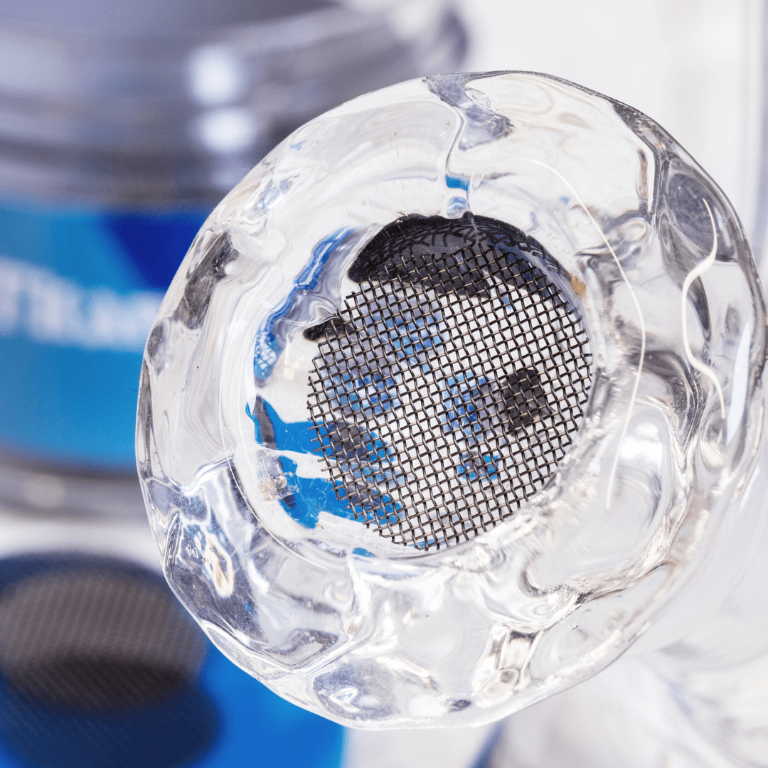 Close-up view of the Pure Titanium Mesh Screens, showcasing a tightly woven, circular mesh against a blurred background.