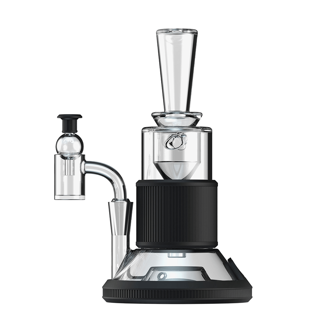 A three-quarter view of the Tandem Rig Kit, showcasing its clear glass construction and compact design against a neutral background.