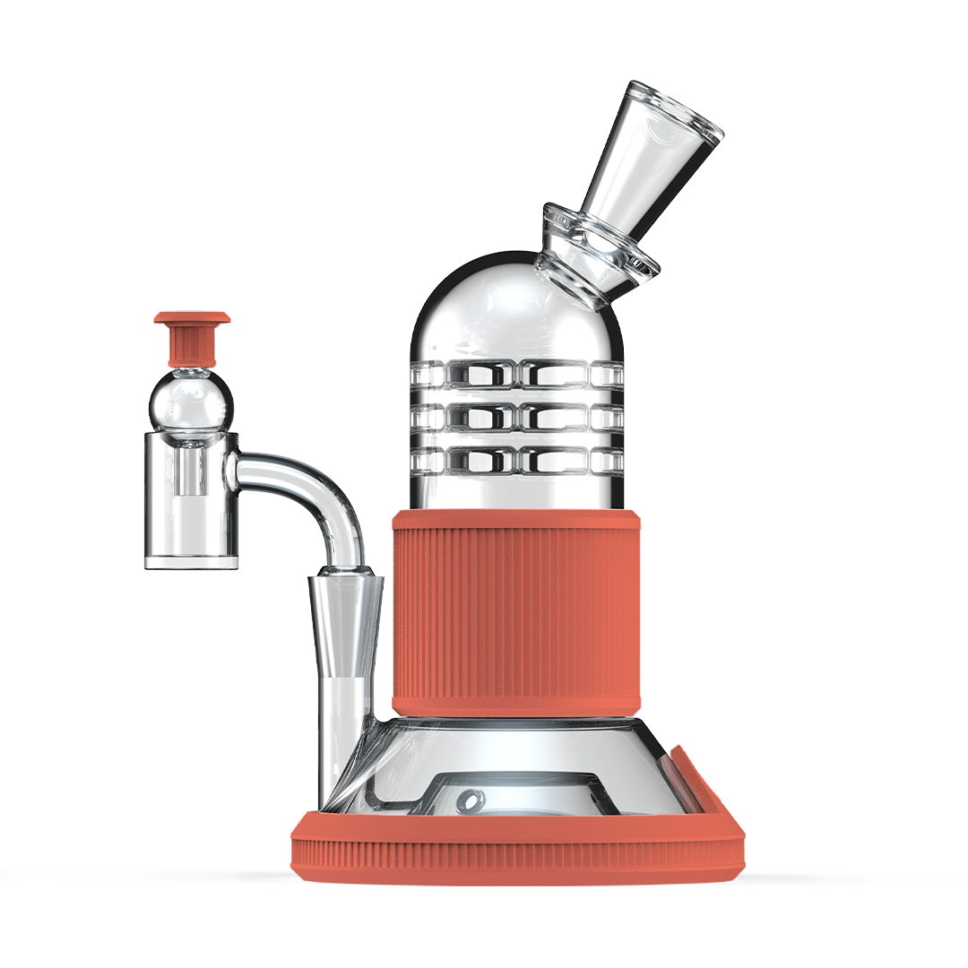 Front view of the Tandem Rig Kit, a clear glass water pipe with a red base, angled slightly to showcase its compact design.