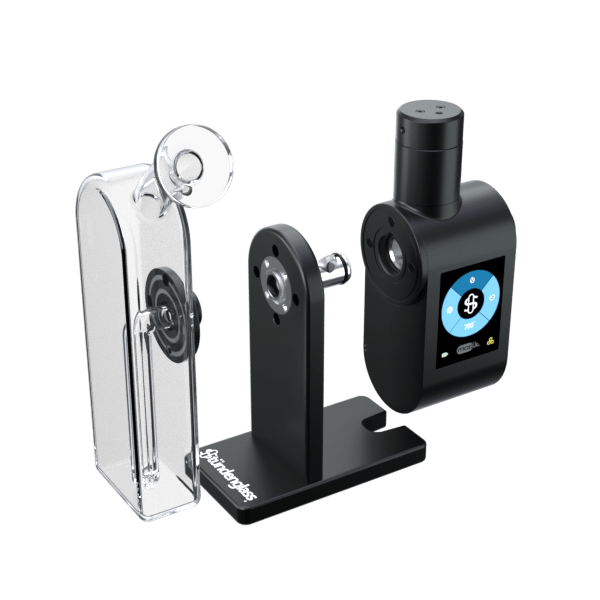 Front view of the Stündenglass Modül + Dok Concentrate Bundle on a dark surface, showing the device's sleek design and metallic finish.