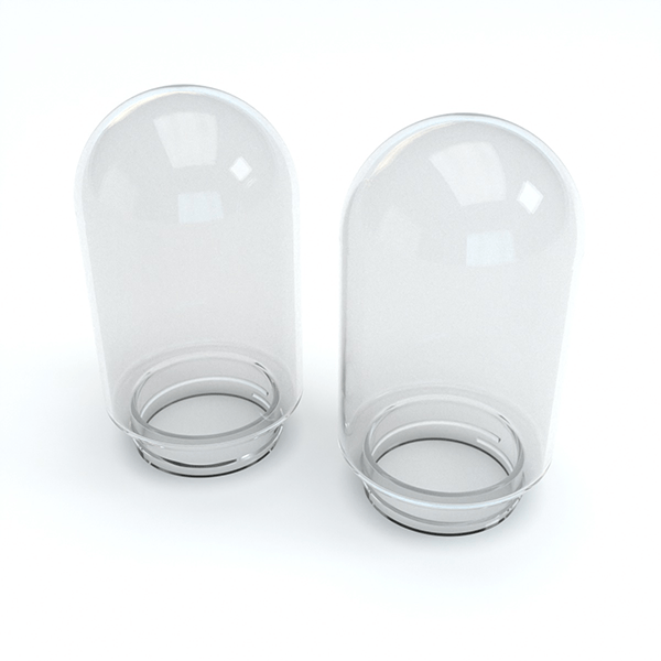 Front-facing view of two clear St?ºndenglass Gravity Infuser glass bells resting on a white background with soft studio reflections.
