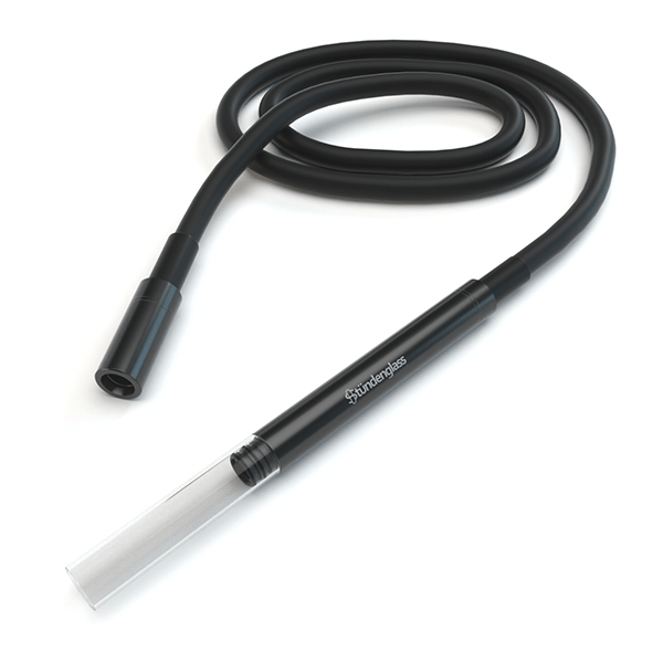 Angled close-up of the Stündenglass Gravity Infuser mouthpiece and flexible black hose coiled on a white background.