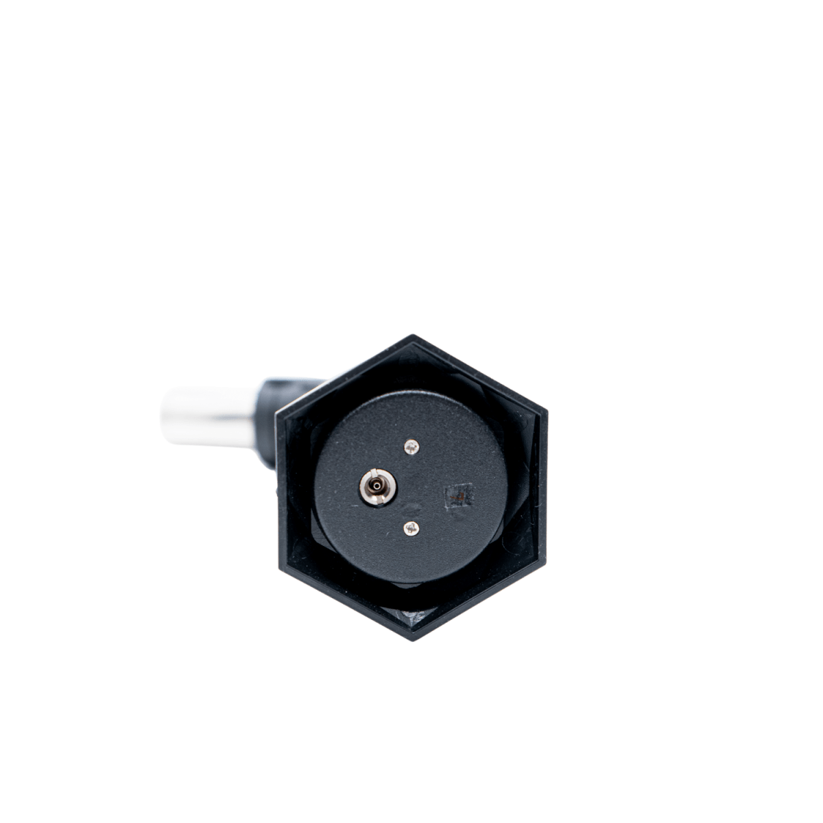 Top-down view of the IGNYT Mini, displaying a dark, circular opening against a plain, neutral background.