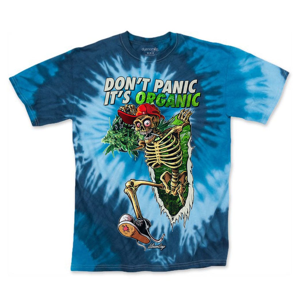 Front-facing blue tie-dye shirt with a cartoon skeleton bursting through and bold "Dont Panic Greens Blue Tie dye" text above the graphic