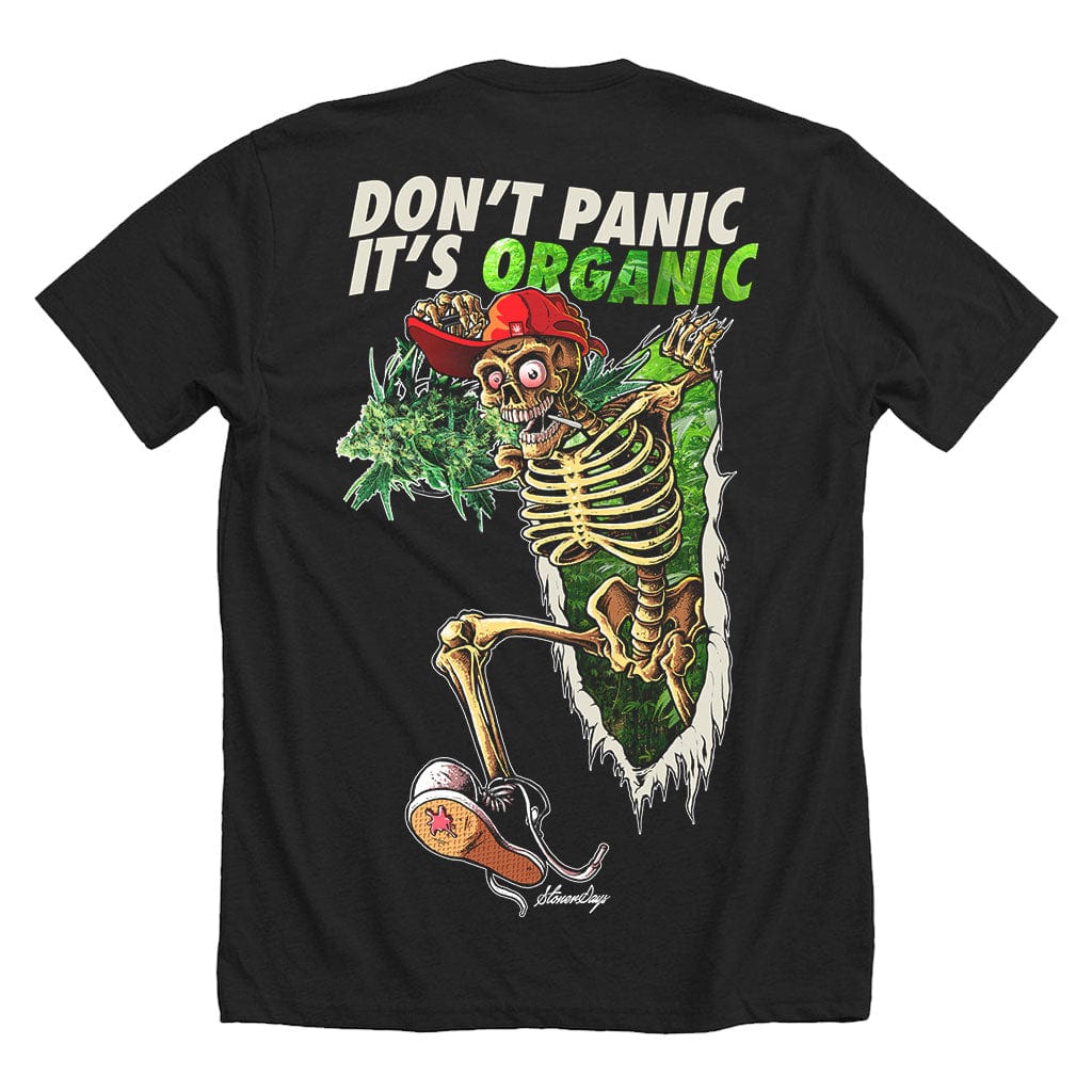 A vibrant graphic on the Dont Panic Greens Tee depicts a leafy, organic design forming the shape of a human heart.