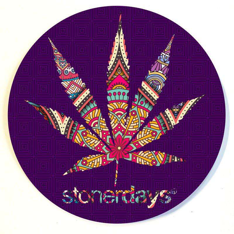 A vibrant Mandala Dab Mats design features a colorful, symmetrical pattern against a dark purple background.