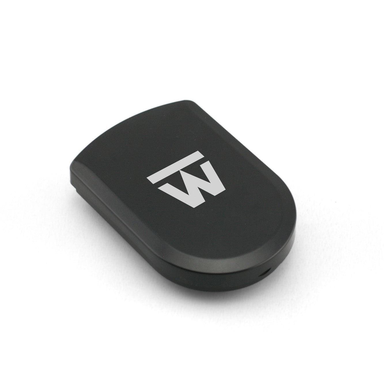 A top-down view of the Truweigh Lynx Scale - 100g x 0.01g, featuring its sleek, dark surface and compact design.