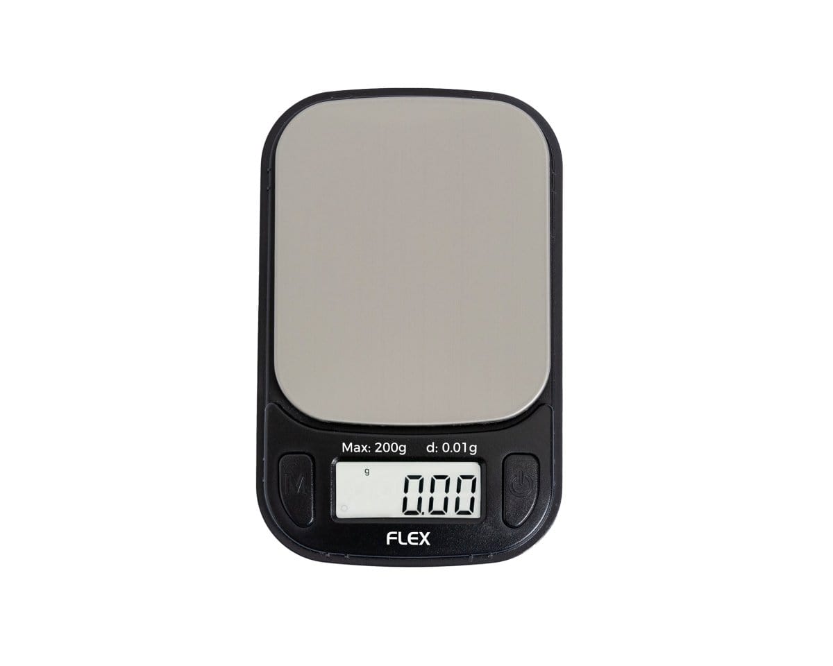 A close-up, top-down view of the Truweigh Flex Mini Scale with a black platform and digital display.
