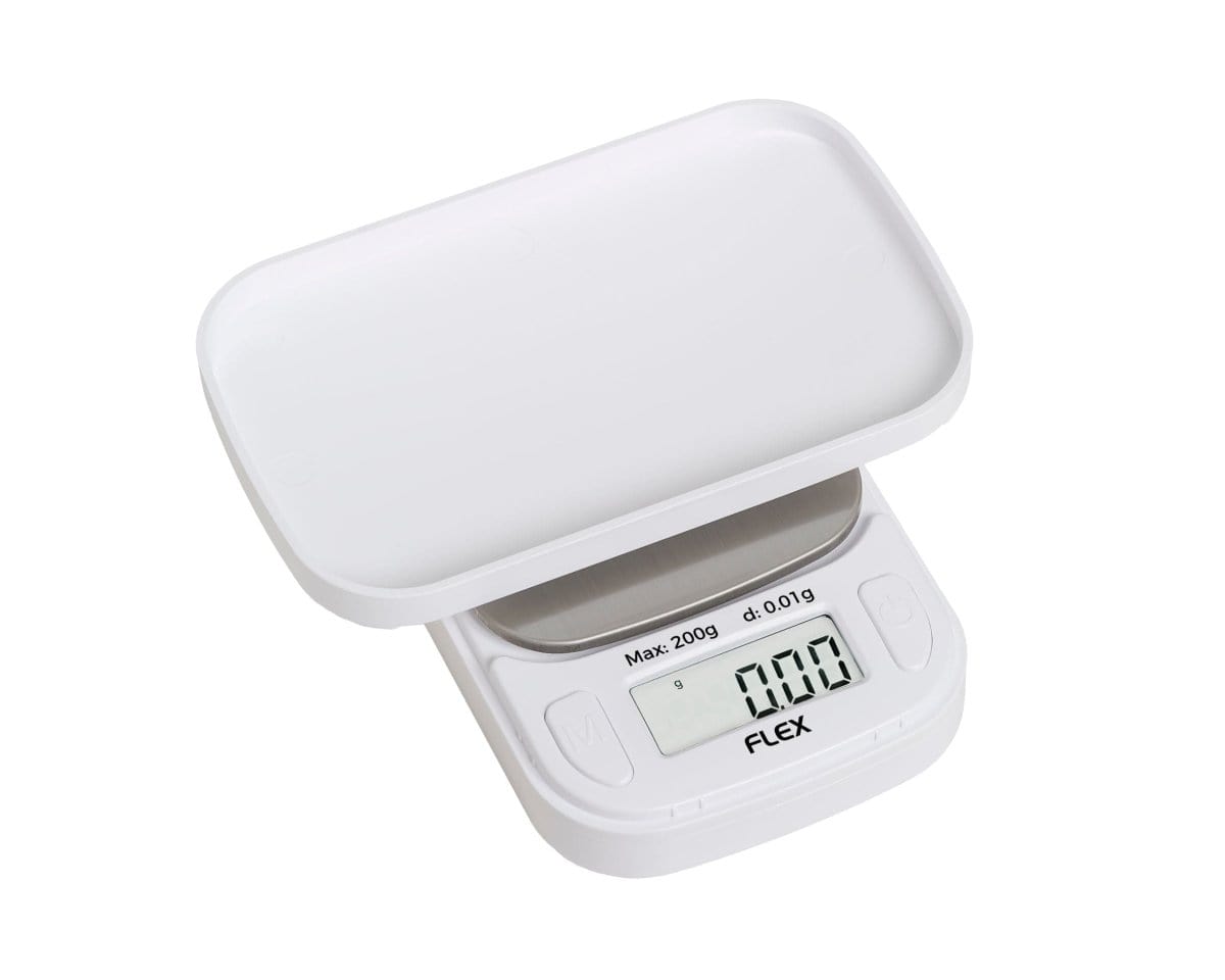 Close-up of the Truweigh Flex Mini Scale, a small digital scale shown at a slight angle against a plain white background.