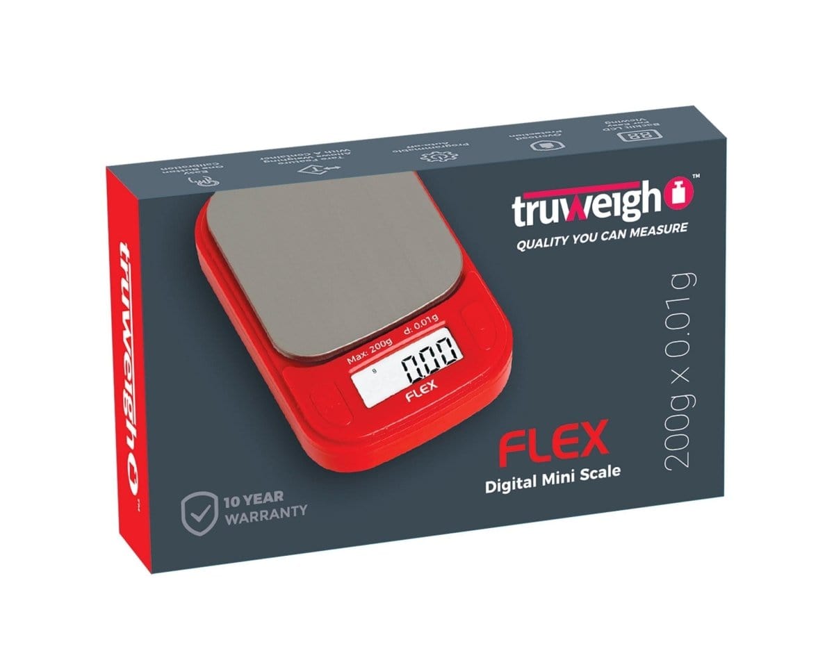 A close-up, angled view of the Truweigh Flex Mini Scale, displaying a digital readout on its sleek, black surface.