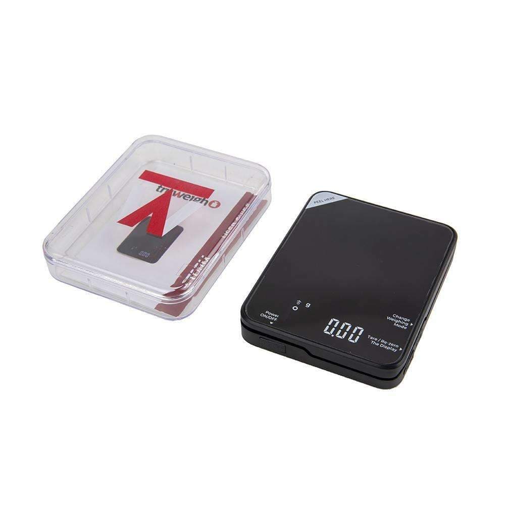 A slightly angled view of the Truweigh Storm Mini Scale 200G X 0.01G with its clear plastic cover partially open.