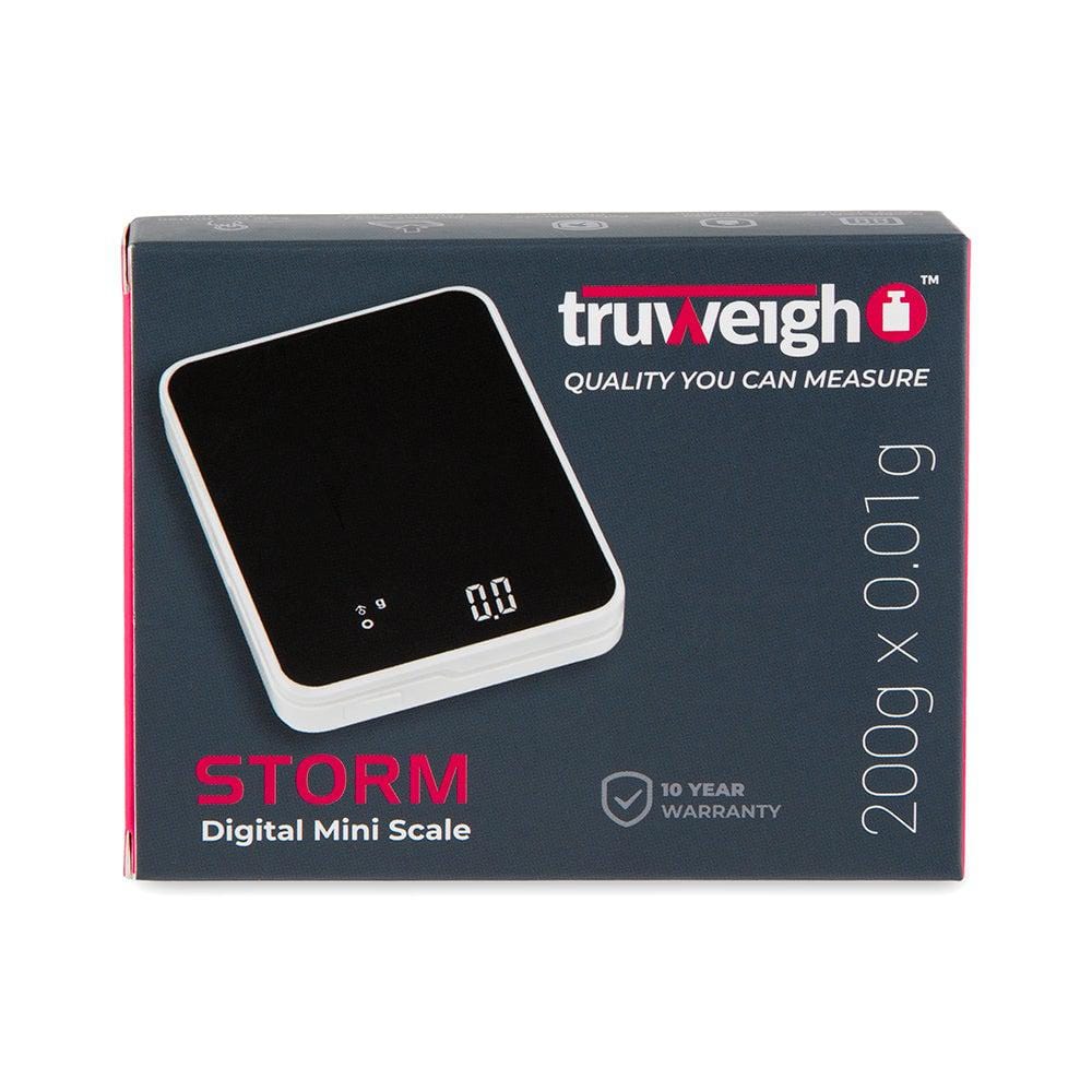 A close-up of the Truweigh Storm Mini Scale 200G X 0.01G displaying a zero reading on its digital screen.