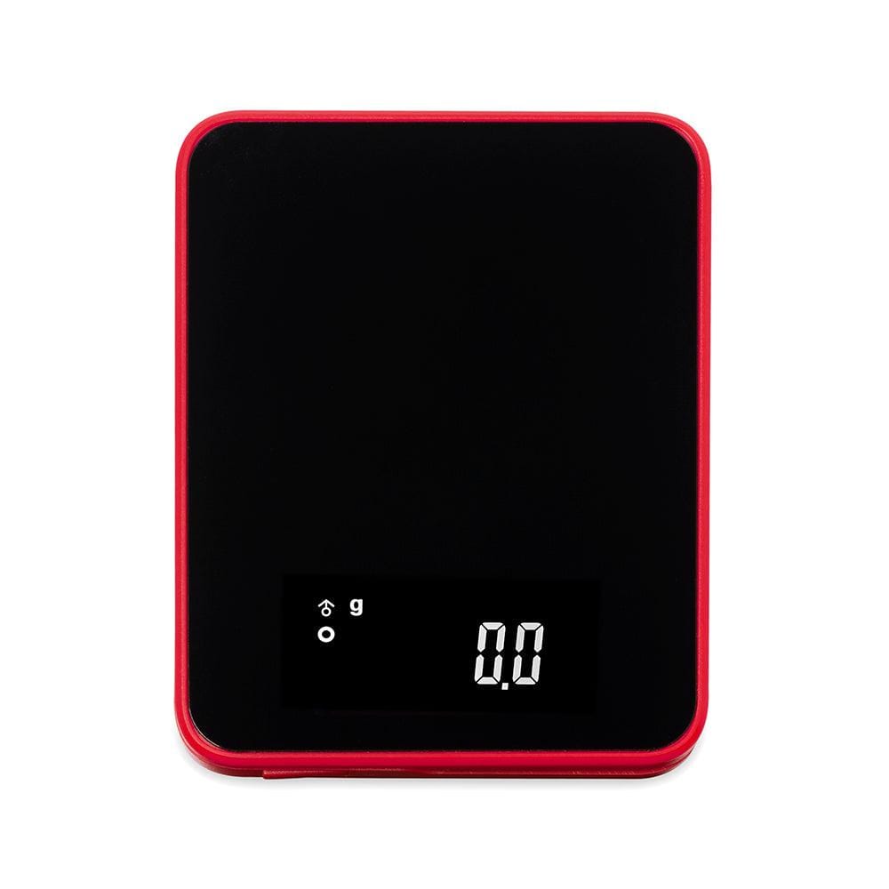A top-down view of the Truweigh Storm Mini Scale 200G X 0.01G with a black surface and red casing.