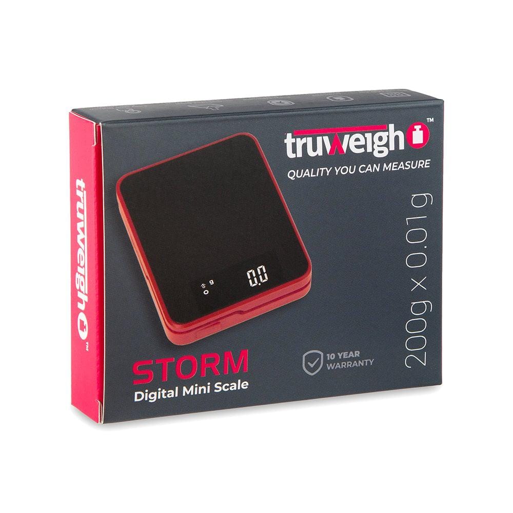A close-up, top-down view of the Truweigh Storm Mini Scale 200G X 0.01G, displaying a digital readout on its black surface.
