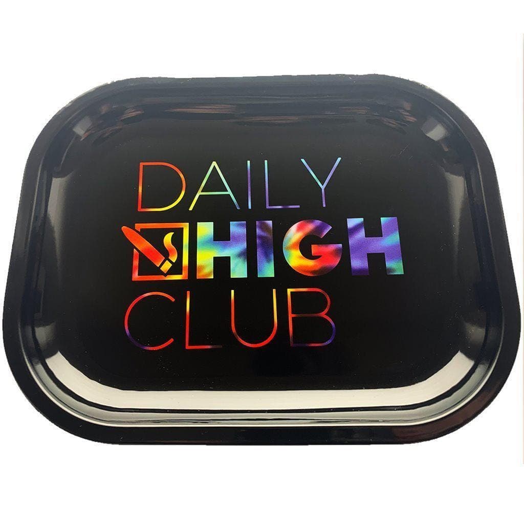Overhead shot of the Daily High Club Rolling Tray, a sleek, rectangular metal tray reflecting light on a dark surface.