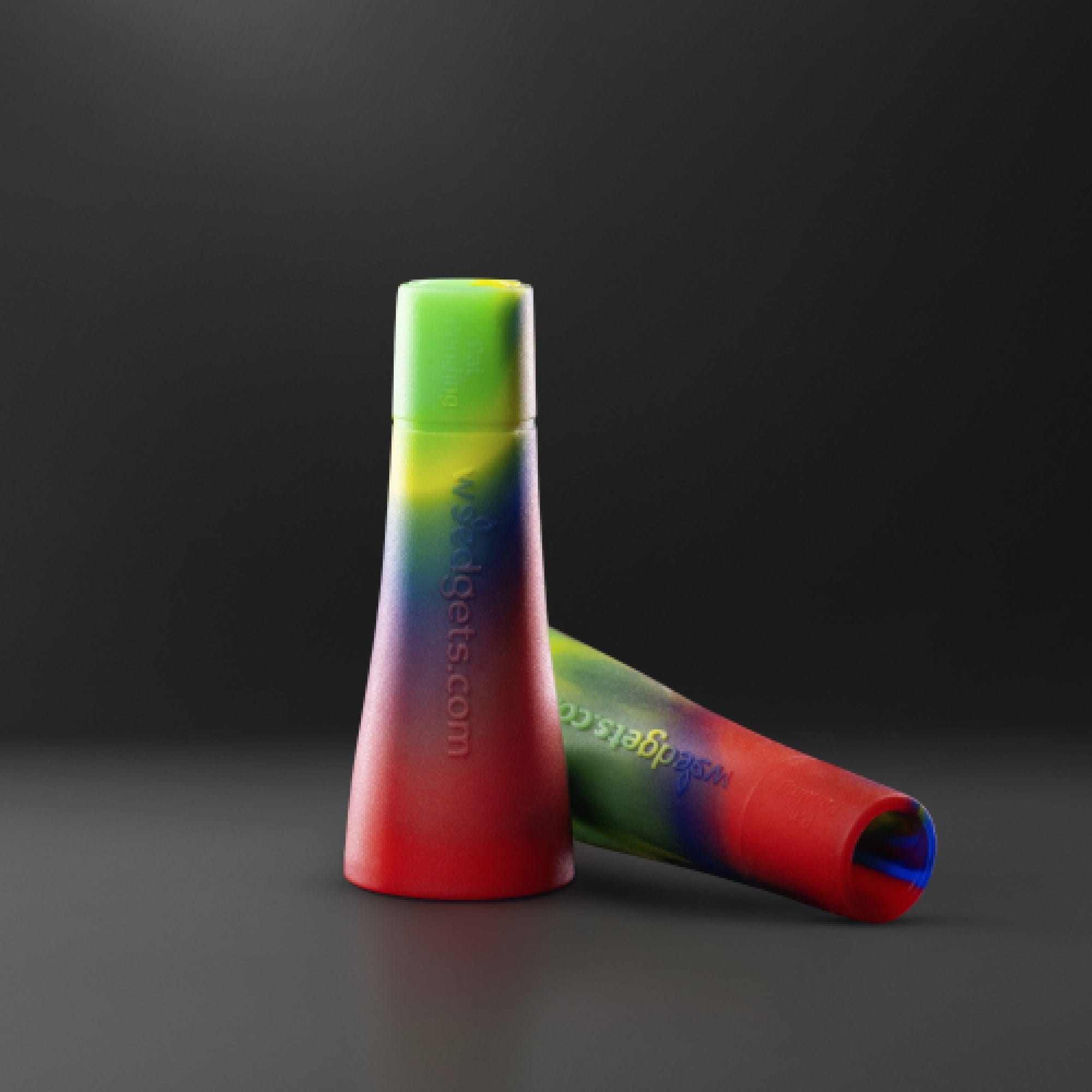 A slightly angled view of the Tic-Toke Filter Tips - MEDIUM set of 2| showing the two paper tips on a black surface.