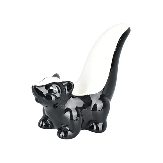 A slightly angled view of the 4.5" Skunk Ceramic Hand Pipe, sculpted as a black skunk with detailed features.