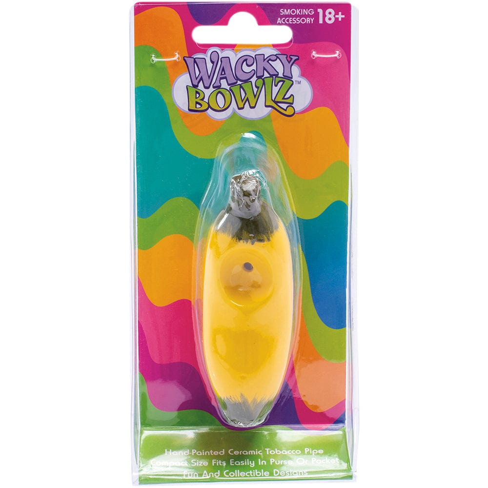 A bright, angled view of the Wacky Bowlz Banana Ceramic Hand Pipe against a colorful background, highlighting its curved form.