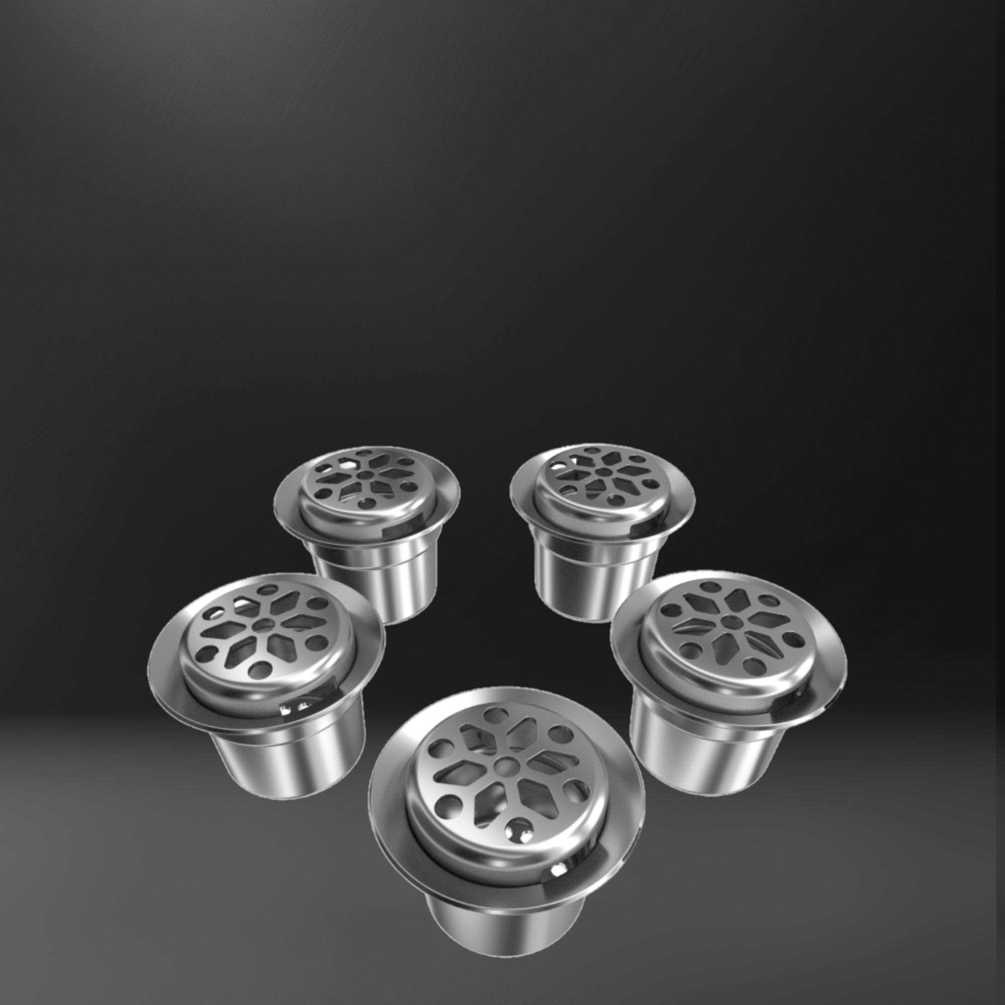 A slightly angled view showcases several silver **PODs - Replacement bowls for the MAZE & SLIDER Pipes**, each with a perforated bowl, against a dark background.