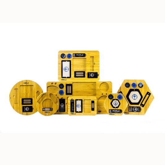 Overhead shot of the Bamboo Trays, showcasing a set of natural wood serving trays arranged on a white surface.